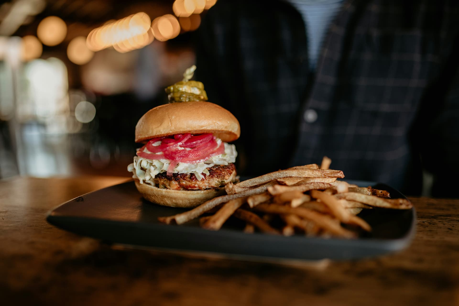 Burger and chips at cosy ski resort bar
